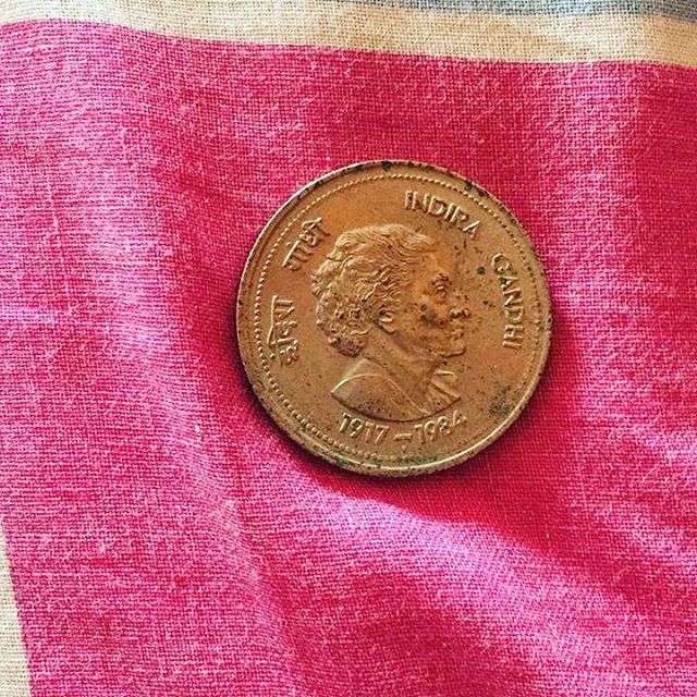 Which country has a lady's image on the currency? Venessa shared this picture of a Rs.5 coin with an image on Indira Gandhi embossed on it. 
#currency #coin